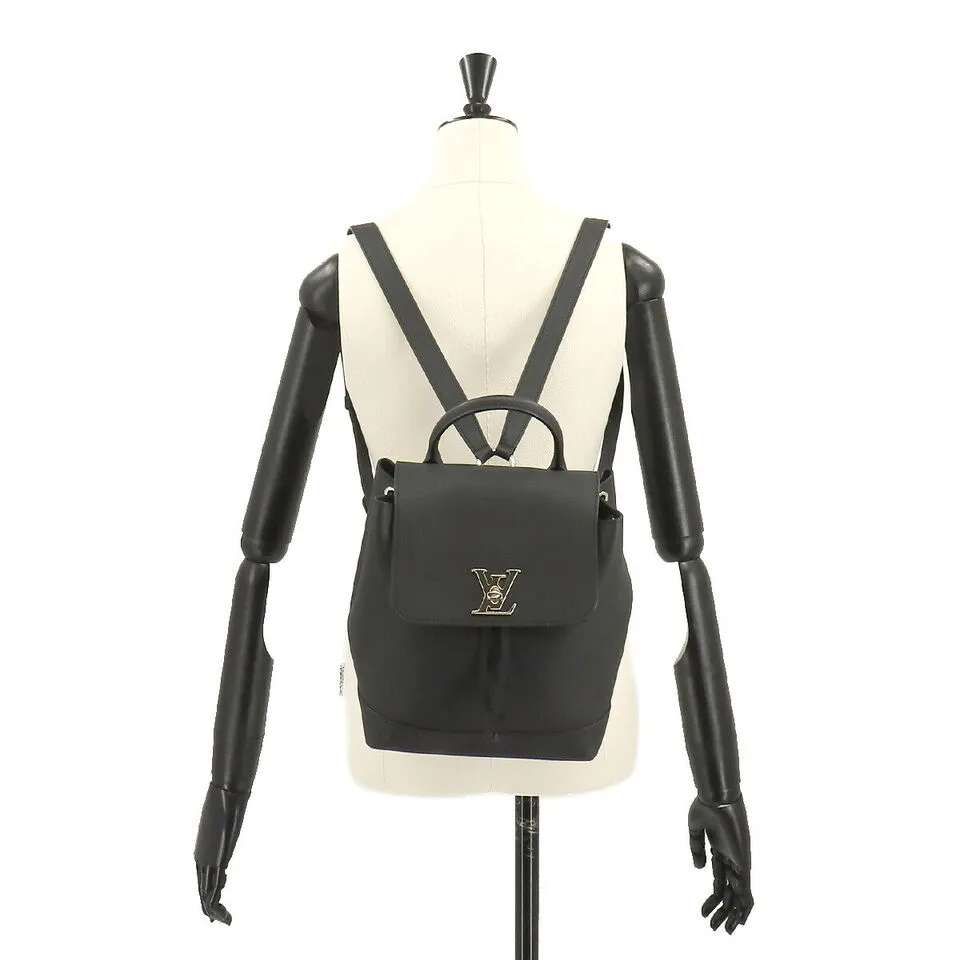 LOUIS VUITTON Lock Me  Leather Noir Black Backpack