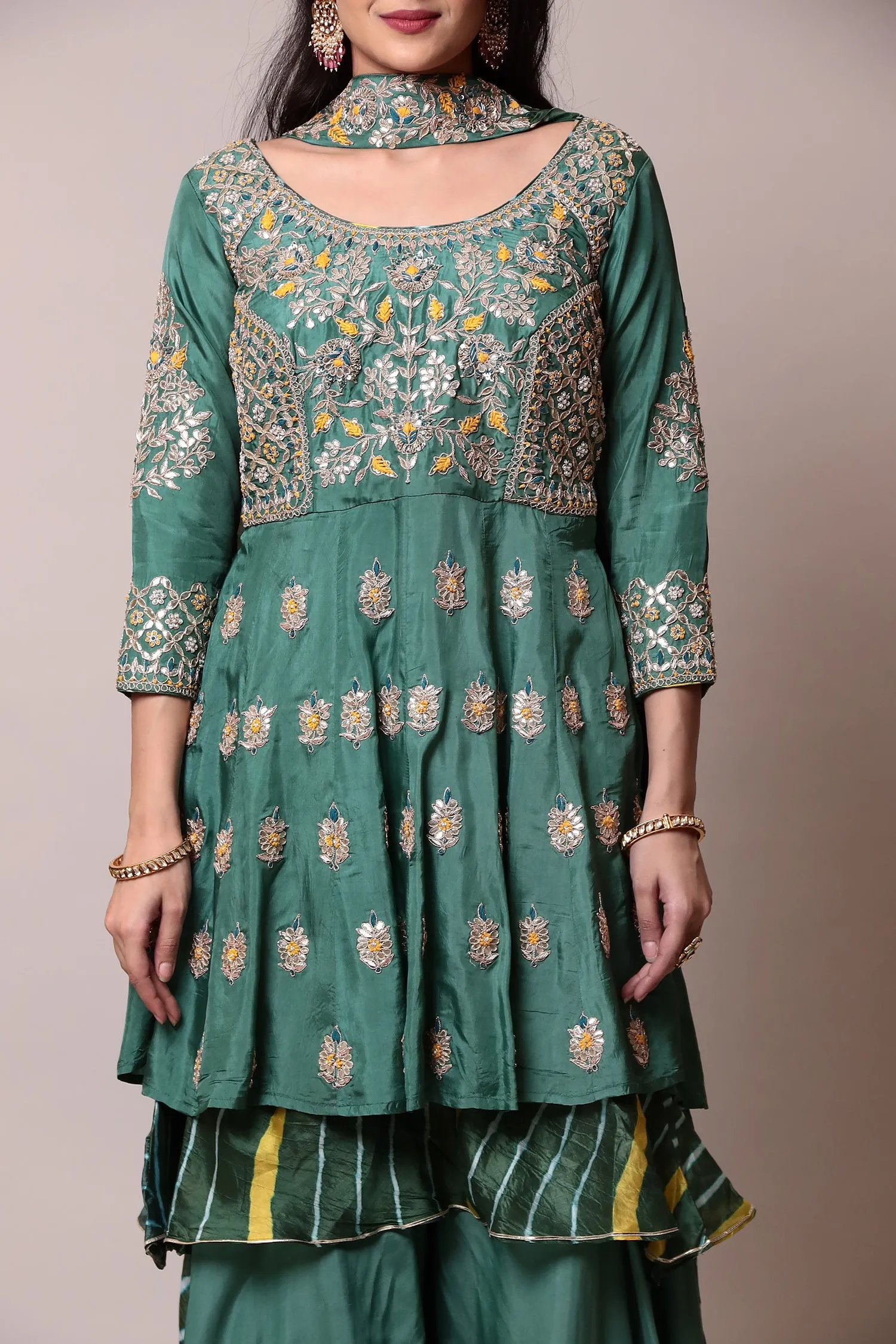 Silk Suitwith Gota Patti, Pearl, Thread work.