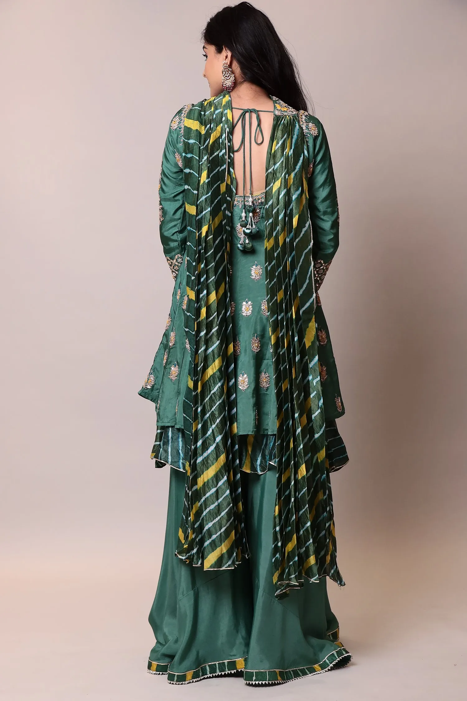 Silk Suitwith Gota Patti, Pearl, Thread work.