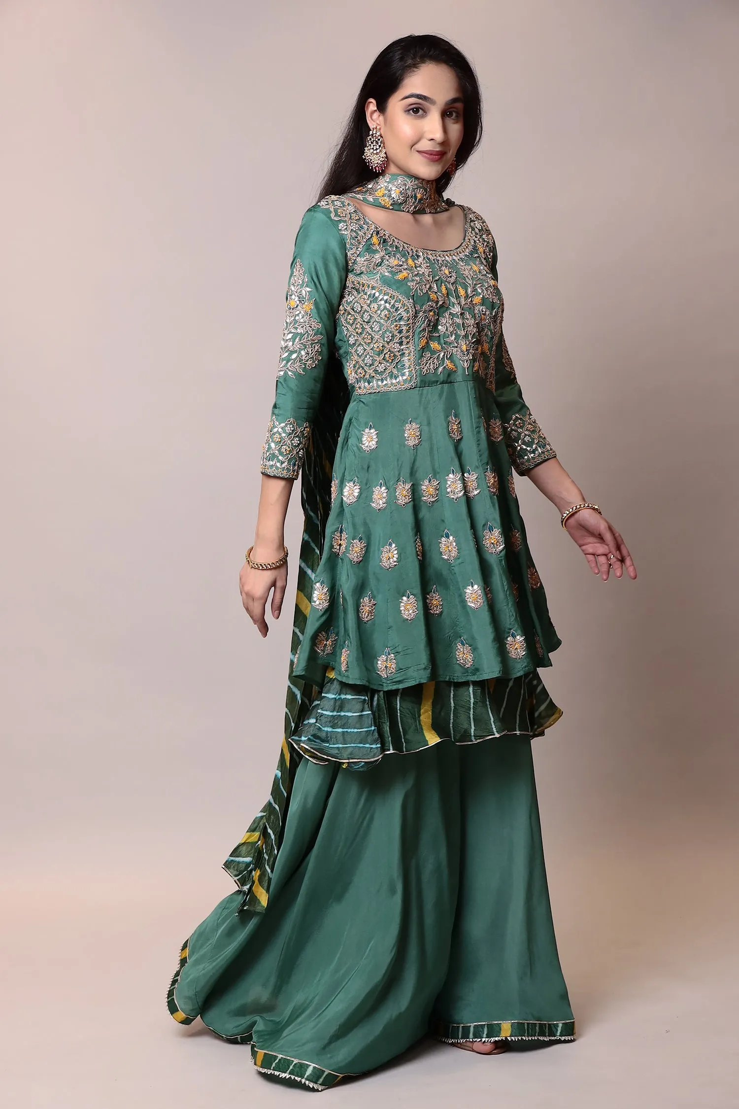 Silk Suitwith Gota Patti, Pearl, Thread work.