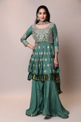 Silk Suitwith Gota Patti, Pearl, Thread work.
